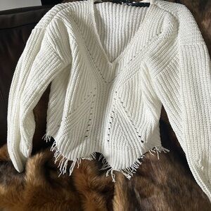 A very nice, very chic lightweight sweater for cool evenings-